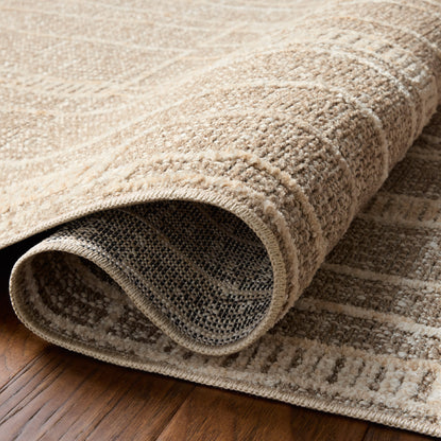 Rolled detail view of Homvirex Bexley Mushroom Natural rug