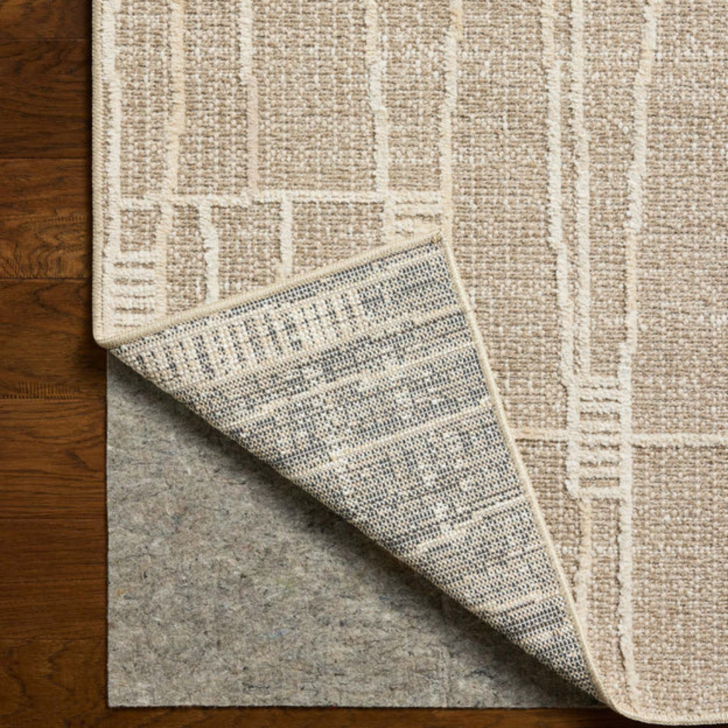 Edge and backing detail of Homvirex Bexley Mushroom Natural rug