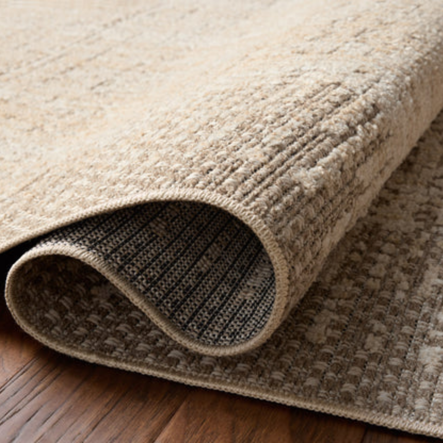 Rolled detail view of Homvirex Bexley Natural Taupe rug