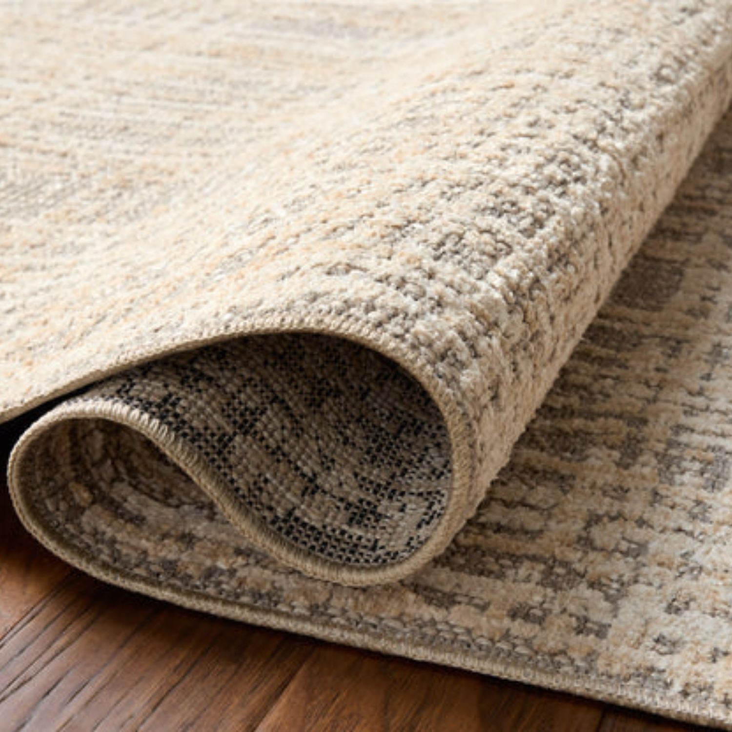 Rolled detail view of Homvirex Bexley Natural Dove rug