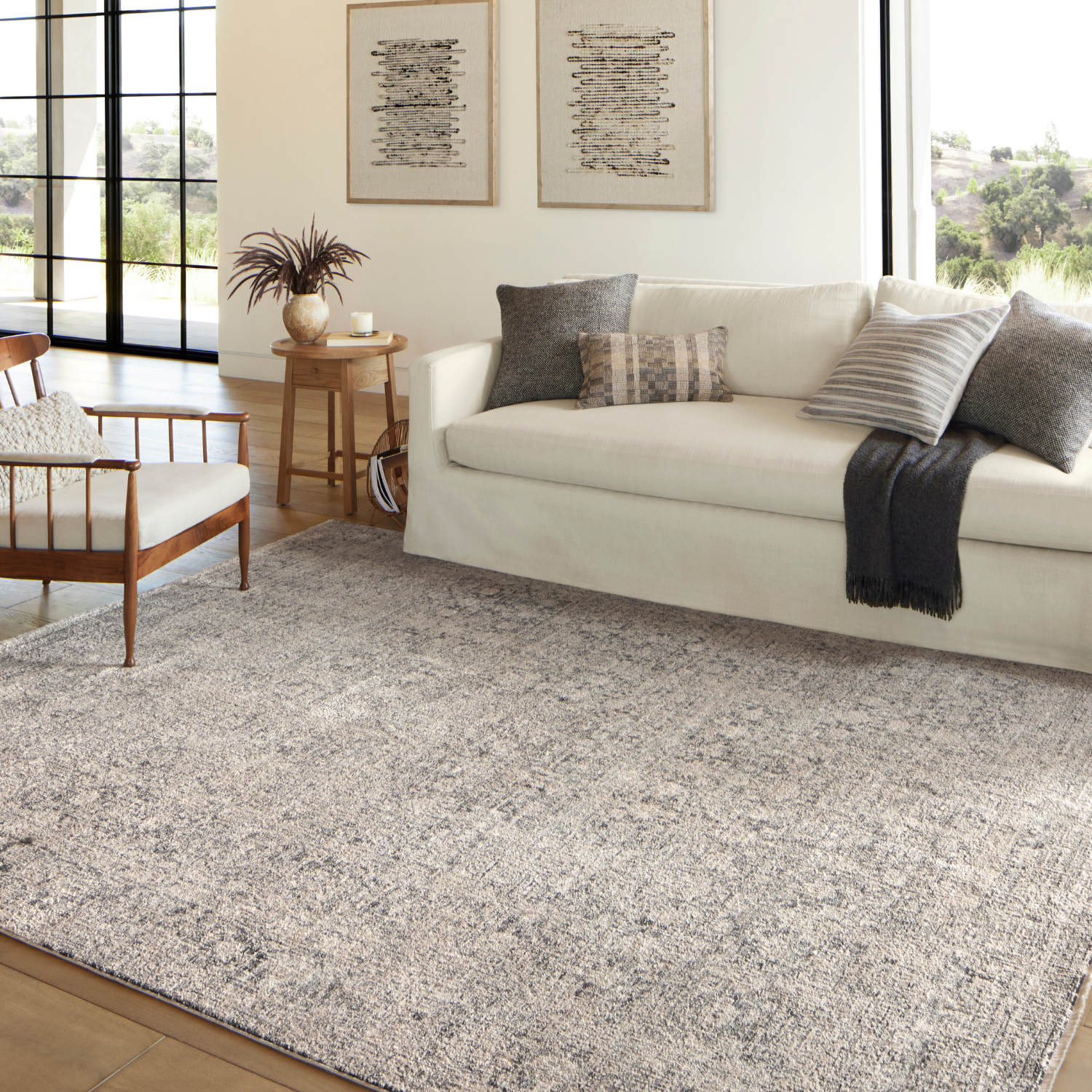 Homvirex Alie Stone Mist rug styled in a modern living room