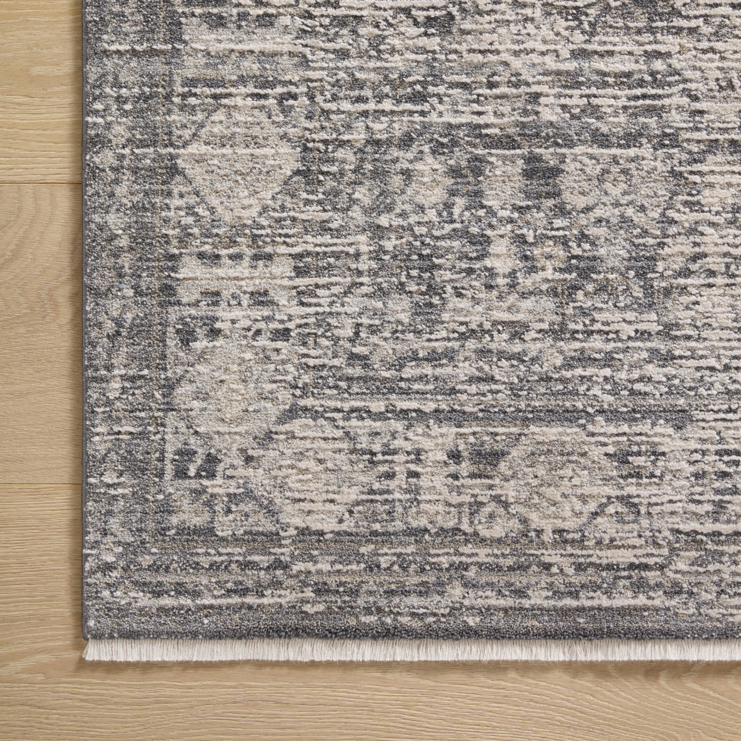 Corner detail of Homvirex Alie Charcoal Dove rug