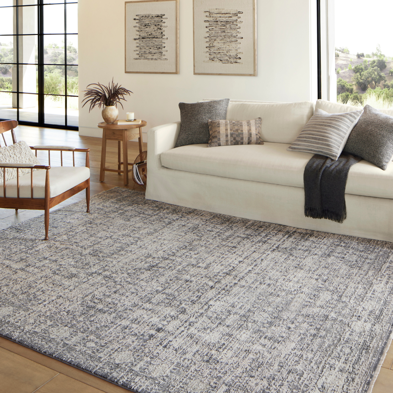 Homvirex Alie Charcoal Dove rug styled in a modern living room