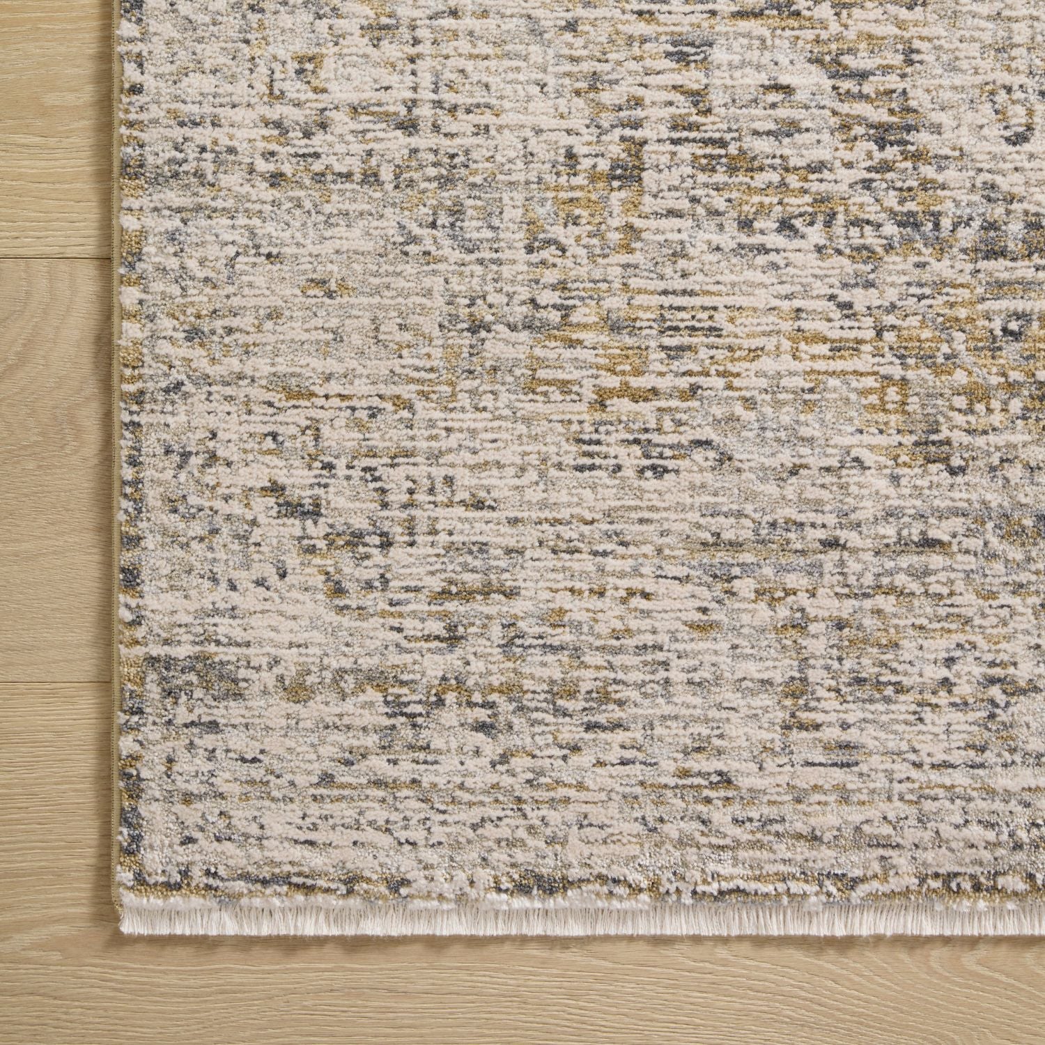 Corner detail of Homvirex Alie Gold Beige rug